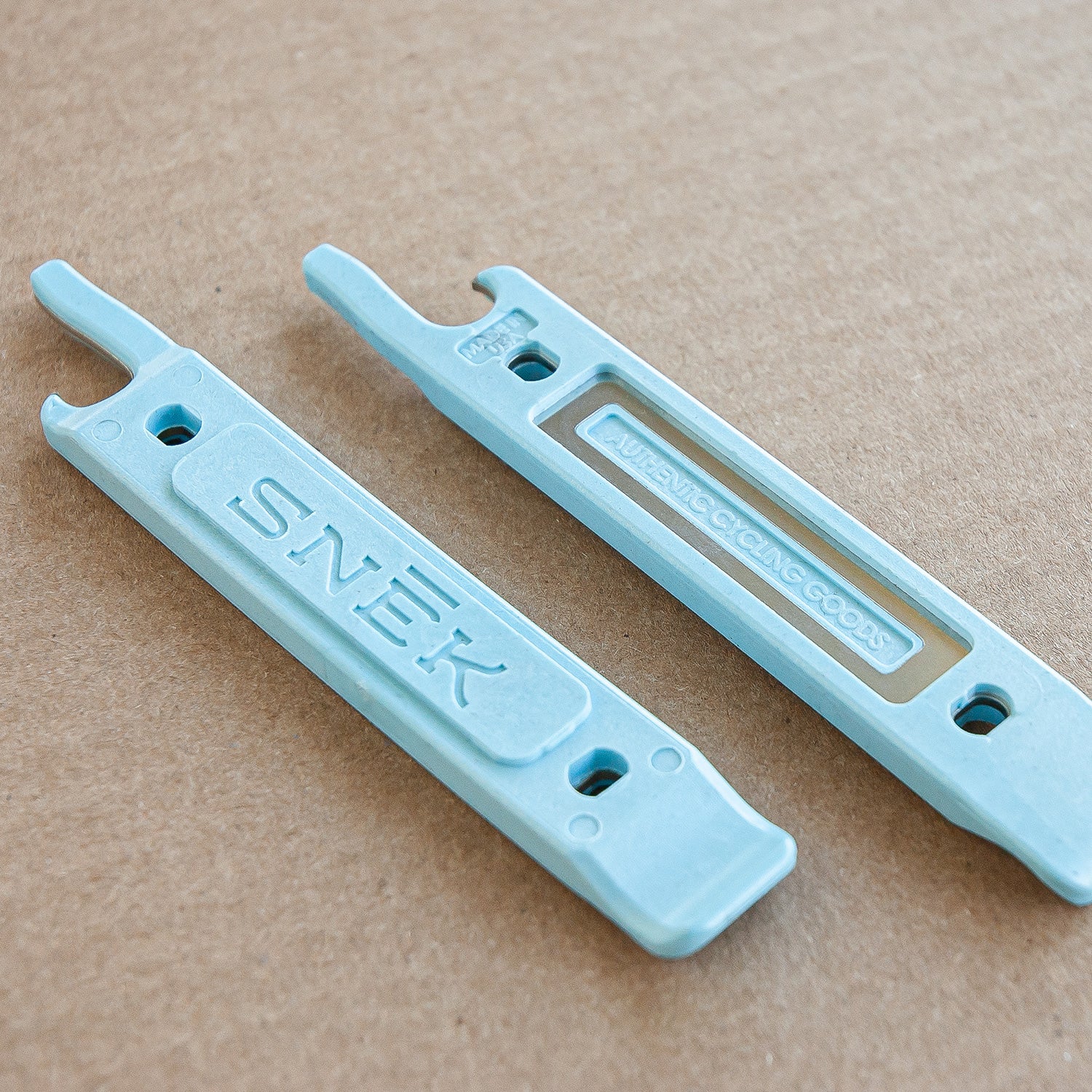 snek cycling lifeboat tire lever and valve core remover detail in baby blue