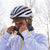 Female cycling athlete wearing the polartec hardface winter cap with neck gaiter in utah