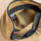 snek cycling polartec hardface winter cap detail of internal soft fleece lining in coyote brown