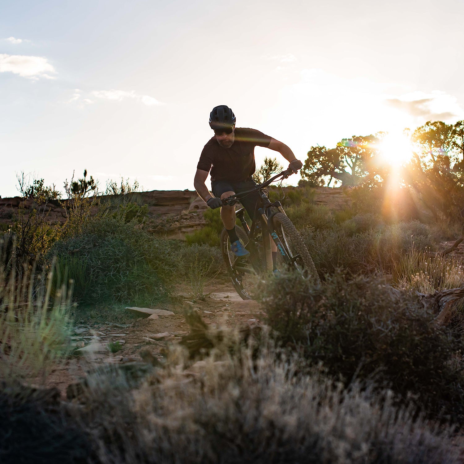mountain biking moab utah with merino tee