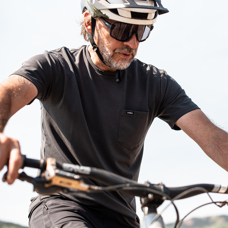 snek cycling purple dry creek pocket tee and jersey product shot for mountain biking and gravel riding