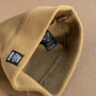 snek cycling detail photo of the soft fleece lining in the hardface beanie