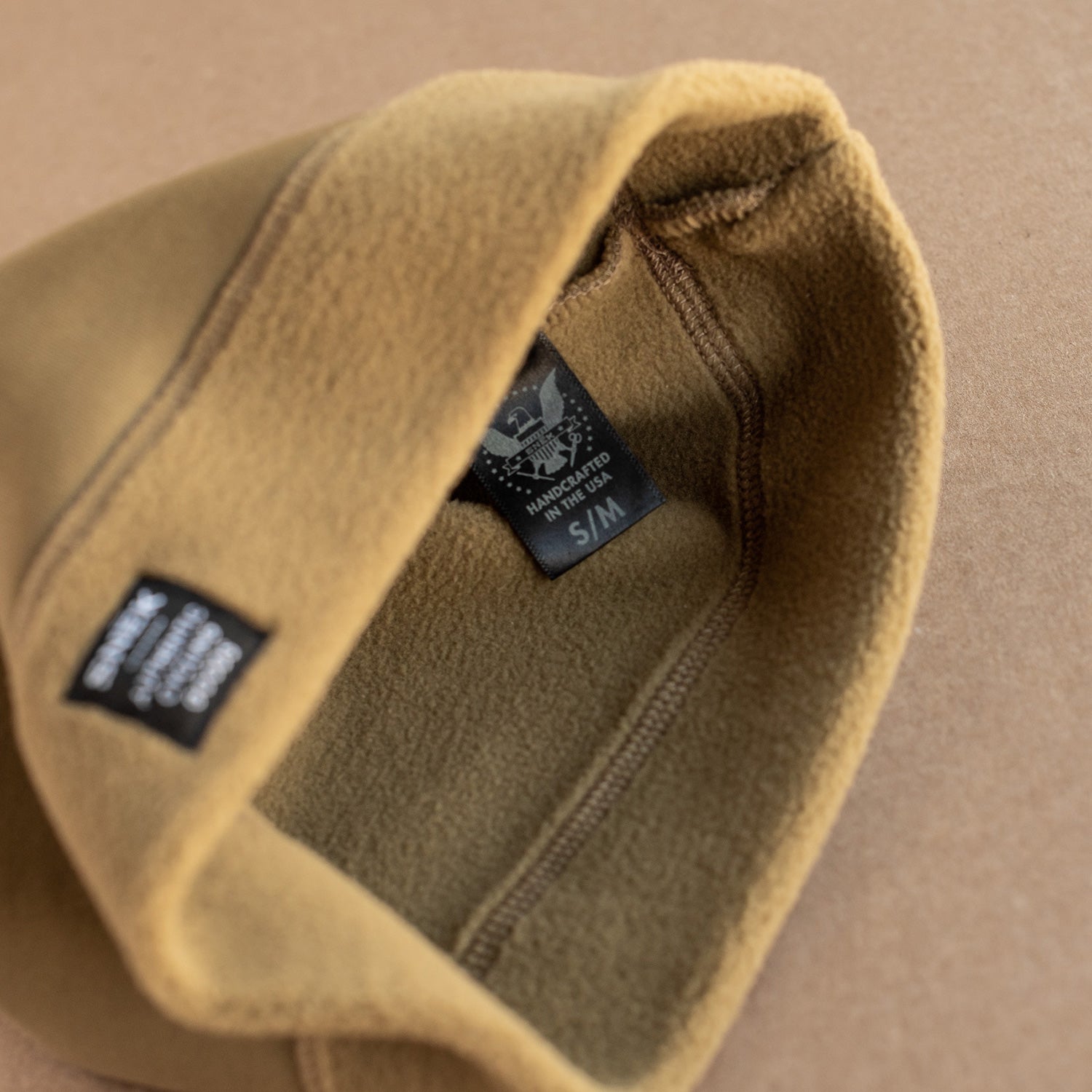 snek cycling detail photo of the soft fleece lining in the hardface beanie