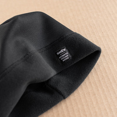 snek cycling hardface fleece beanie detail photo of the hardface outer and soft fleece lining