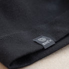 snek cycling merino beanie label