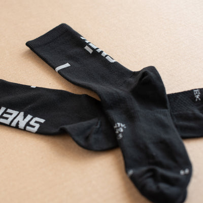 black cycling and performance sock