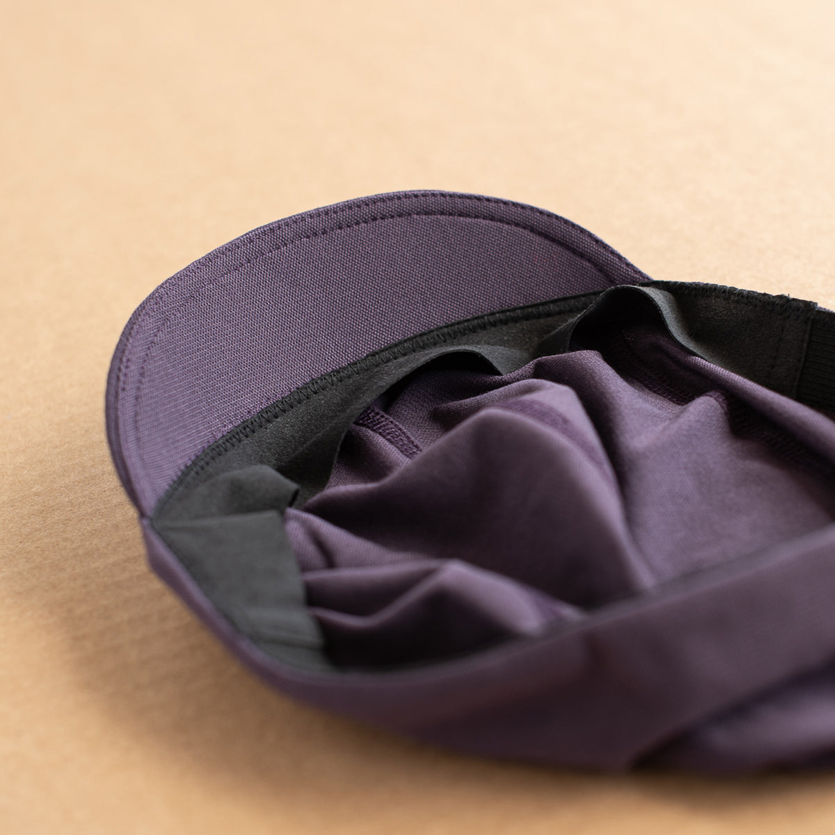cycling cap suede headband and lightweight fabric detail