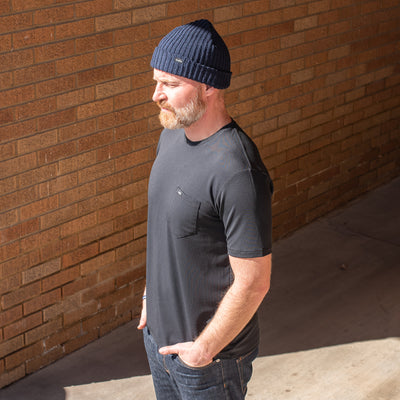 snek cycling dry creek tee on model with knit beanie in color grey